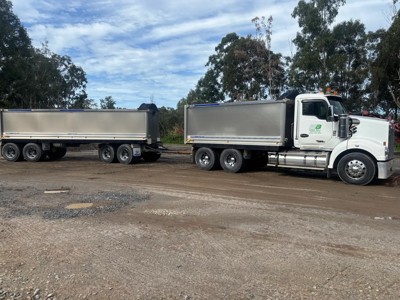 GB Civil tipper and dog trailer hauling bulk material